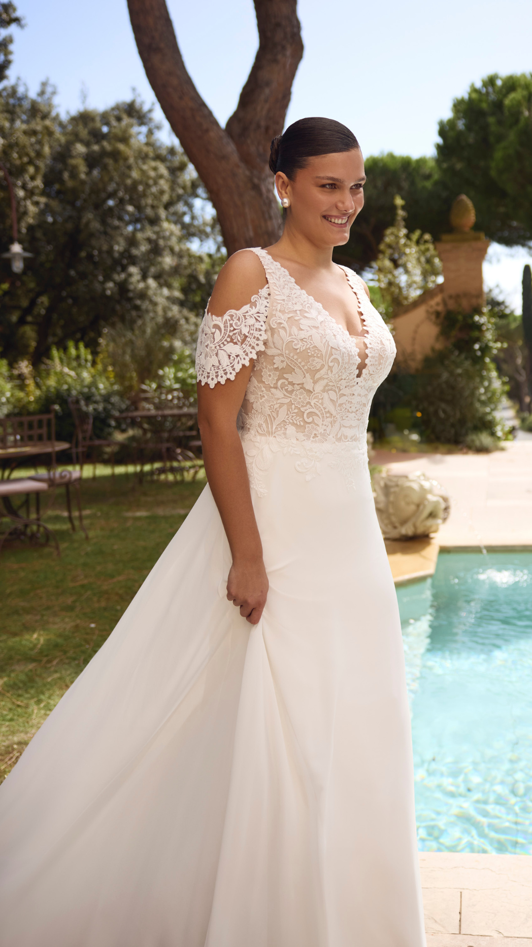 Wedding dress by Modeca Curves