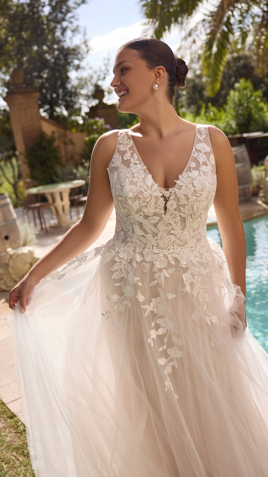 Wedding dress by Modeca Curves