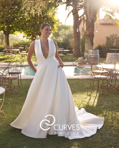 Plus size wedding dress by Modeca Curves