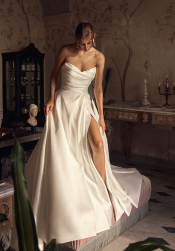 Wedding dress with split by Modeca
